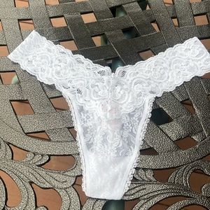 Victorias Secret white lace panties. Size M. New without tags